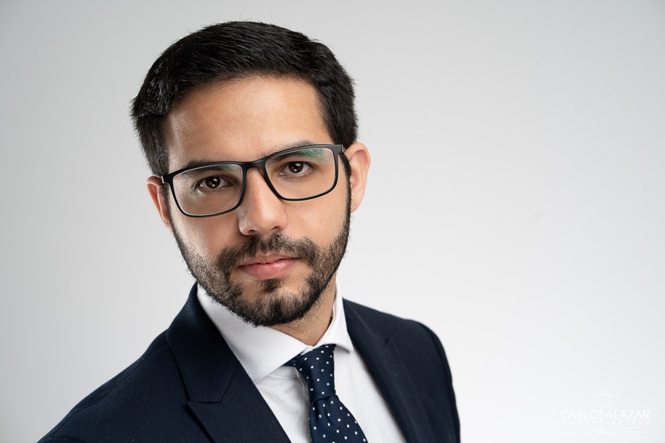 Professional headshot of a man in business attire